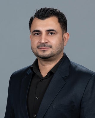 Portrait of Harman Dhaliwal, REALTOR®